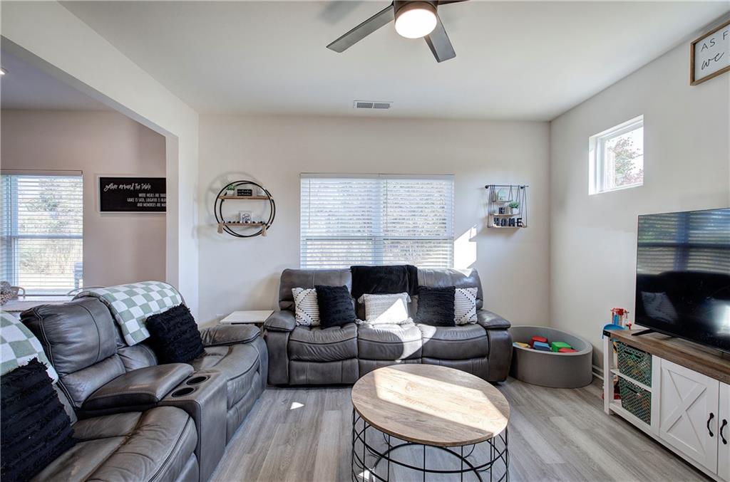 10 Eagle Drive Northwest Cartersville, GA 30121 - Photo 11 of 41 a living room with furniture and a fireplace