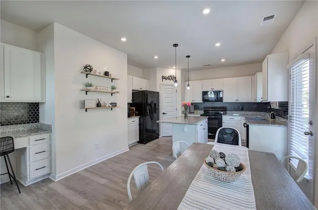 a living room with furniture and a couch