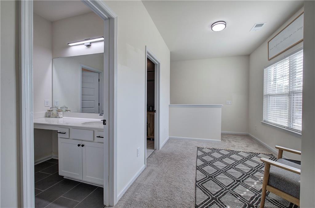 10 Eagle Drive Northwest Cartersville, GA 30121 - Photo 33 of 41 a bathroom with a sink and a mirror
