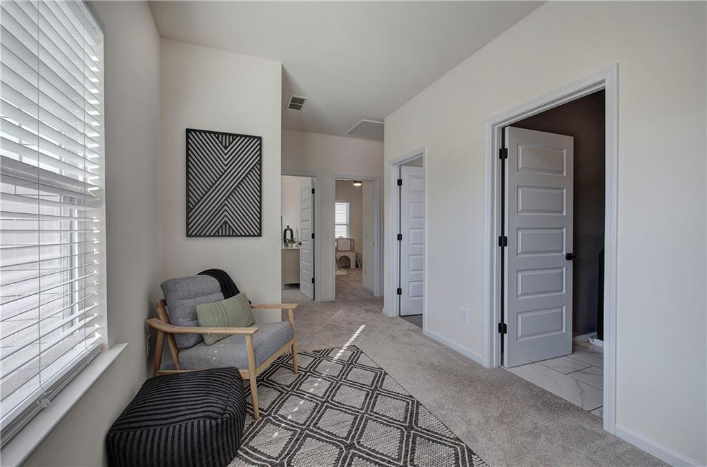 10 Eagle Drive Northwest Cartersville, GA 30121 - Photo 35 of 41 a living room with furniture and a window