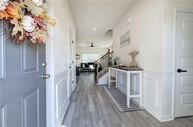 a view of entryway with wooden floor