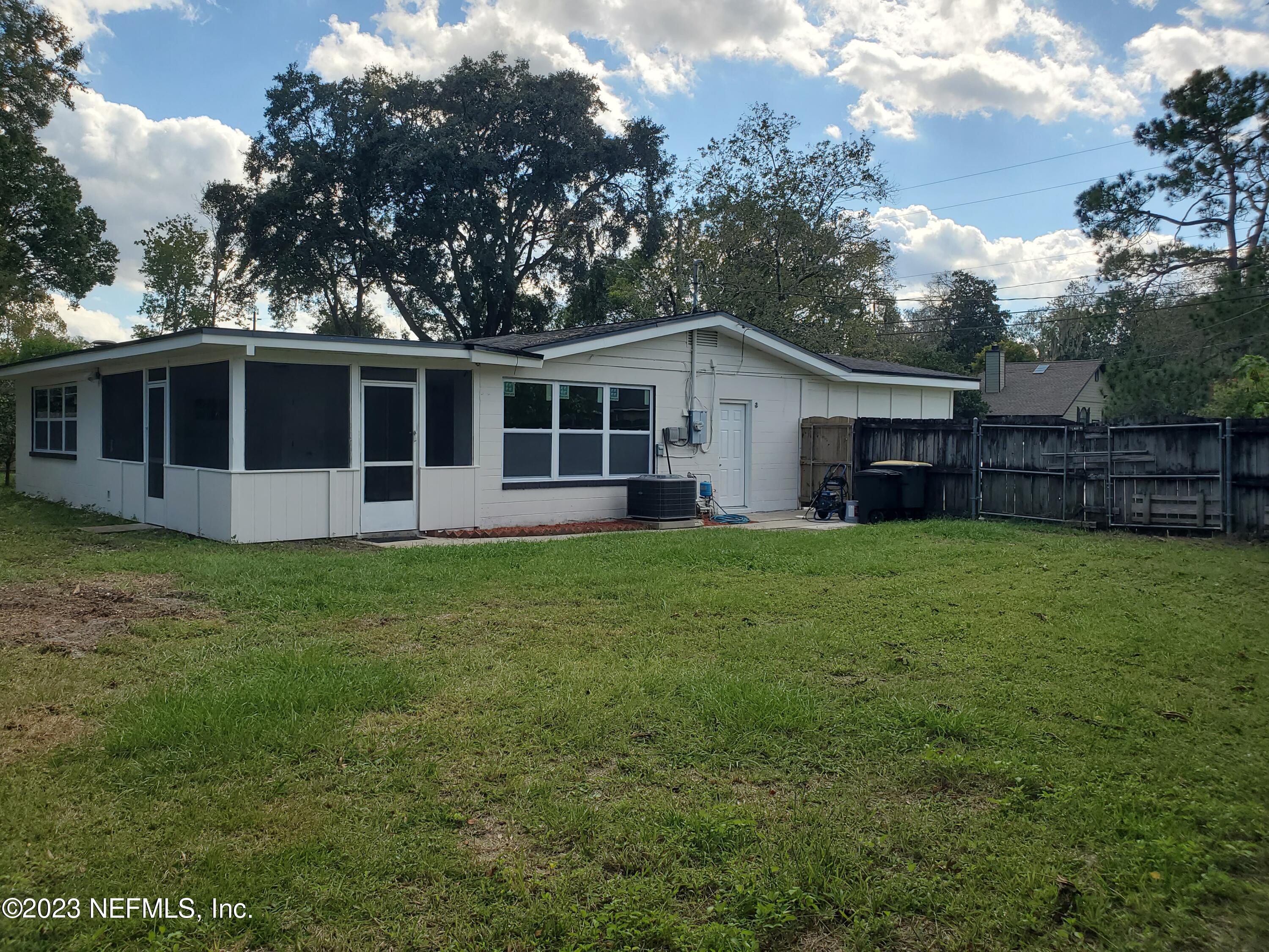 2305 Brest Road Jacksonville, FL 32216 - Photo 28 of 32 a view of a house with yard and porch