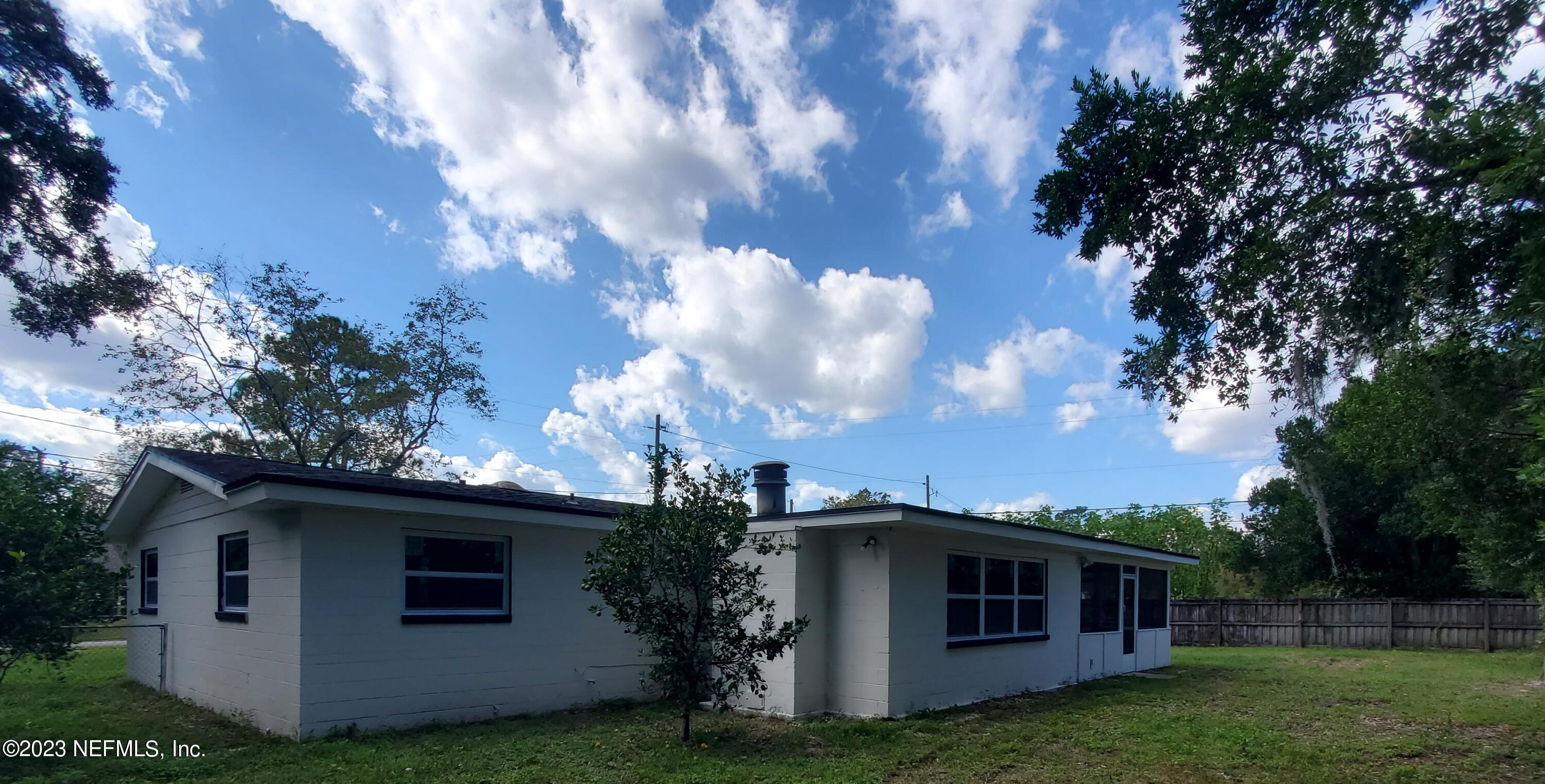 2305 Brest Road Jacksonville, FL 32216 - Photo 29 of 32 a view of a house with a yard