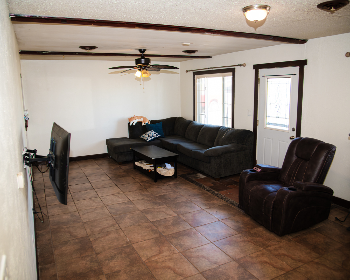 13610 137th Avenue West Taylor Ridge, IL 61284 - Photo 4 of 24 a living room with furniture and a window