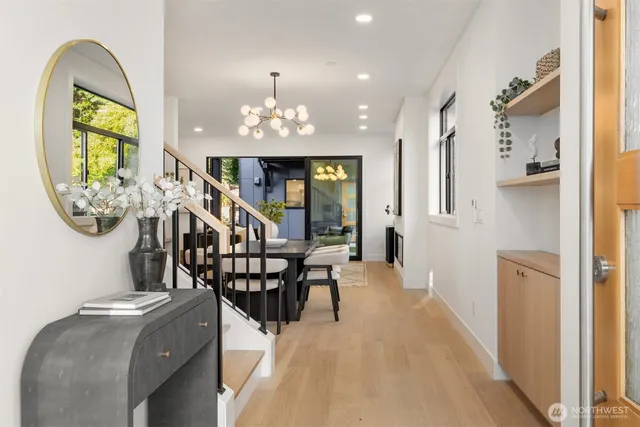 a view of a livingroom with furniture and a chandelier