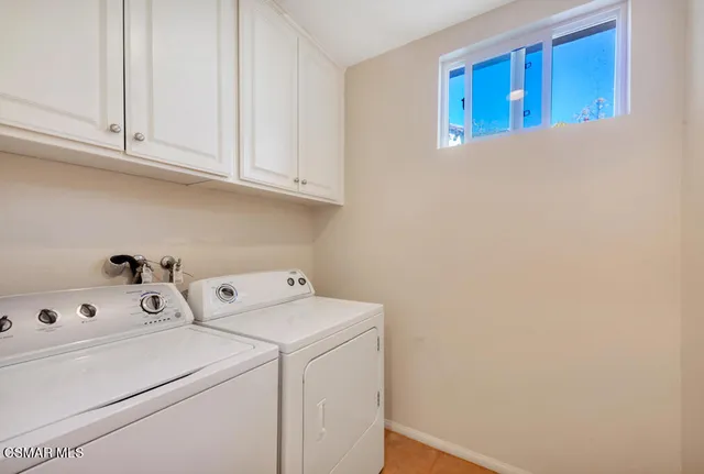 a view of utility room with washer and dryer