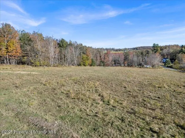a view of an outdoor space with mountain view