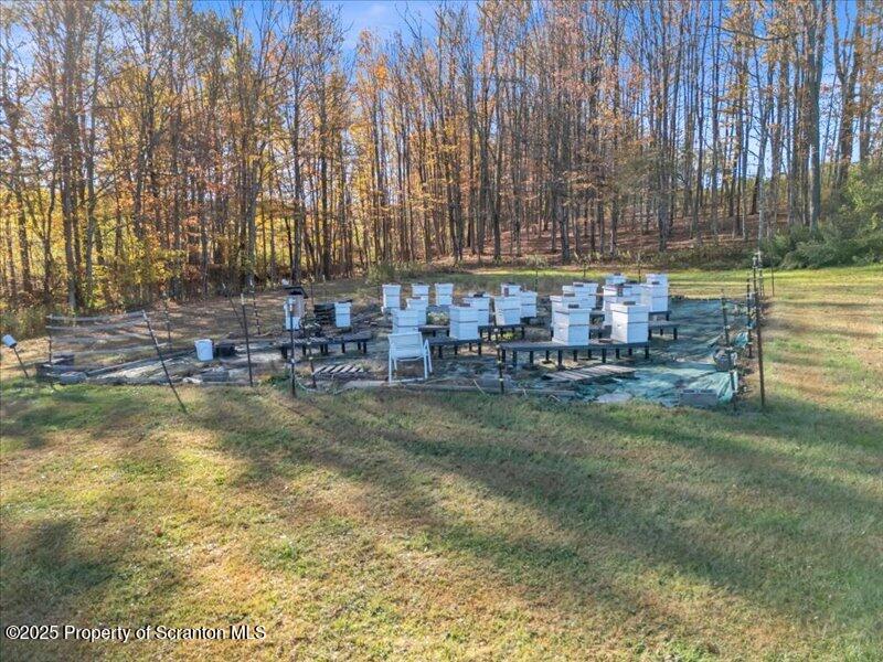 Marshbrook Road Factoryville, PA 18419 - Photo 15 of 34 a swimming pool with outdoor seating and yard
