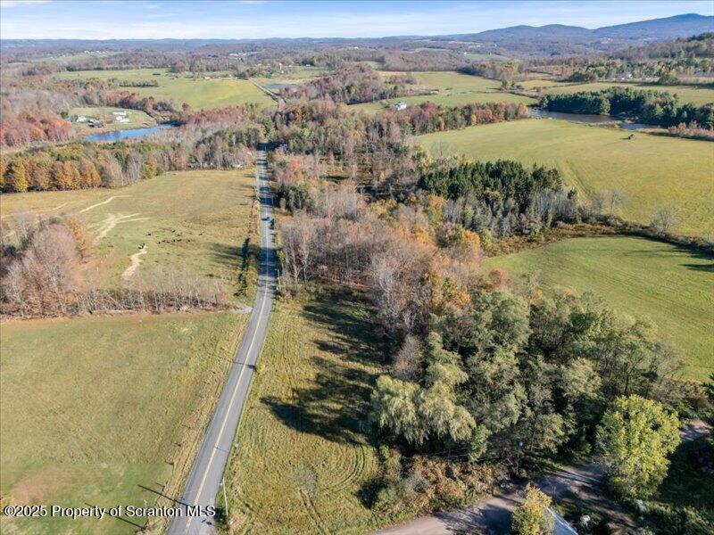 Marshbrook Road Factoryville, PA 18419 - Photo 17 of 34 an aerial view of ocean with residential house and lake view