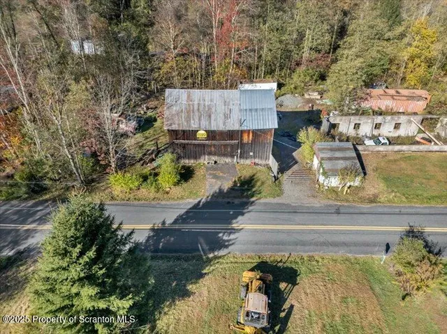 a view of balcony with wooden floor