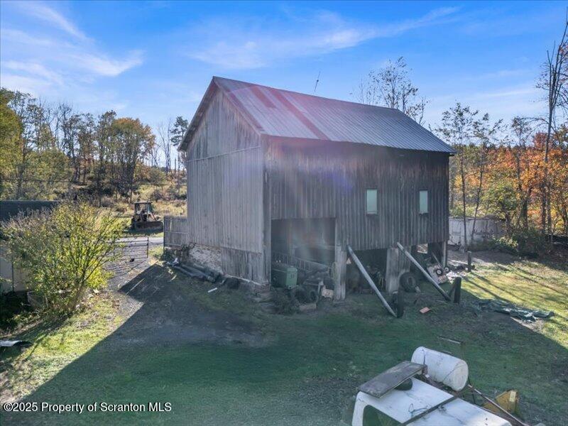 Marshbrook Road Factoryville, PA 18419 - Photo 23 of 34 a view of a house with a yard
