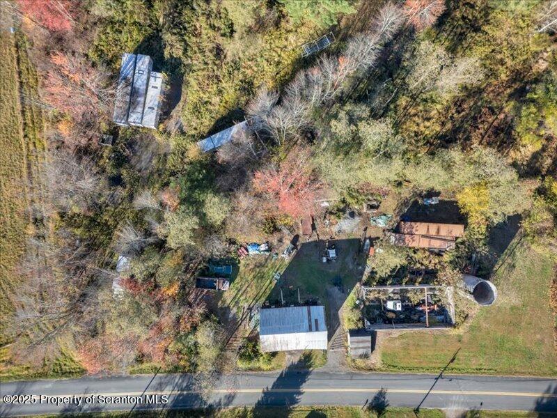 Marshbrook Road Factoryville, PA 18419 - Photo 25 of 34 an aerial view of a house with a yard and large trees