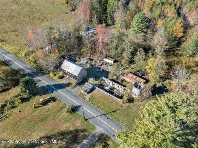 a small pool with a yard