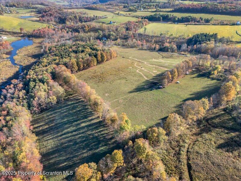 Marshbrook Road Factoryville, PA 18419 - Photo 3 of 34 a view of a lake with outdoor space