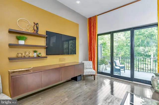 a spacious bedroom with a bed and window