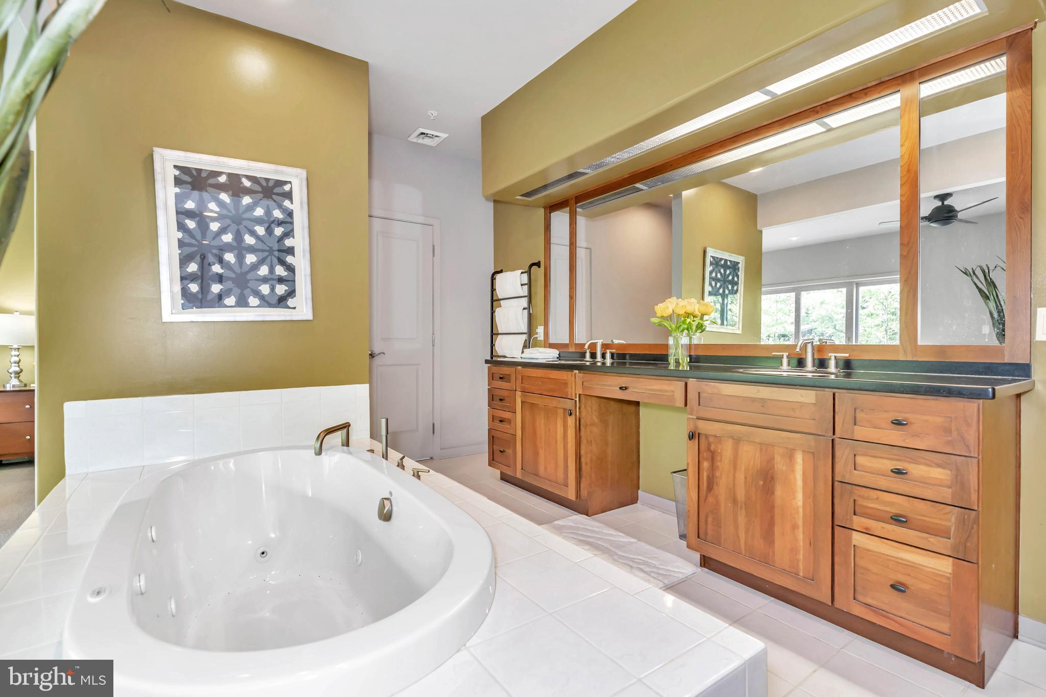 118 Bancroft Mills Road Wilmington, DE 19806 - Photo 30 of 40 a bathroom with a sink and a bathtub