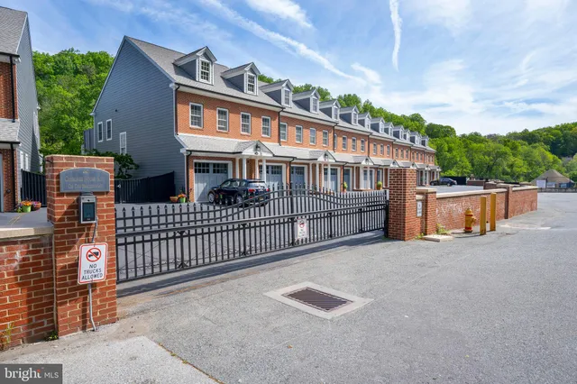 front view of a house with a street