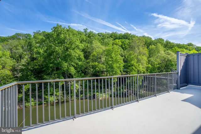 a view of a balcony with lake view