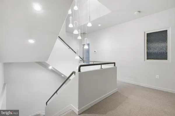 a view of a hallway with entryway