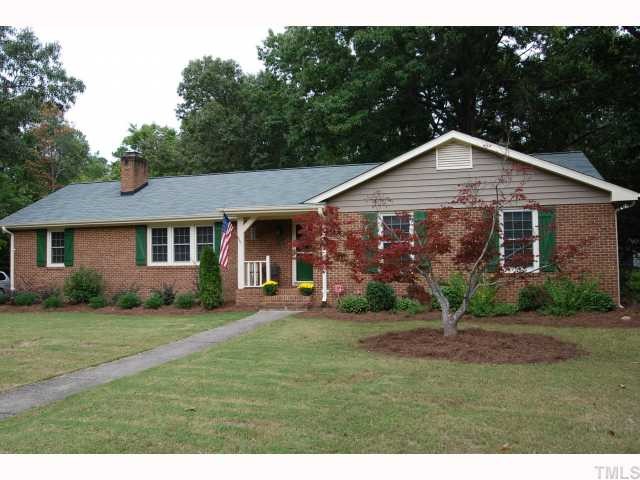 7516 Deer Track Drive Raleigh, NC 27613 - Photo 11 of 11 Professionally Landscaped Brick Ranch with Rear Entry Garage, Open Floor Plan, & Screened Porch.