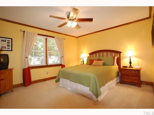 7516 Deer Track Drive Raleigh, NC 27613 - Photo 6 of 11 Spacious Master Bedroom has Lighted Ceiling Fan, Plantation Blinds, Security System Key Pad & a Walk-in Closet with organizers. The Master Bath has a Shower, Ceramic Tile Flooring & Linen Closet.