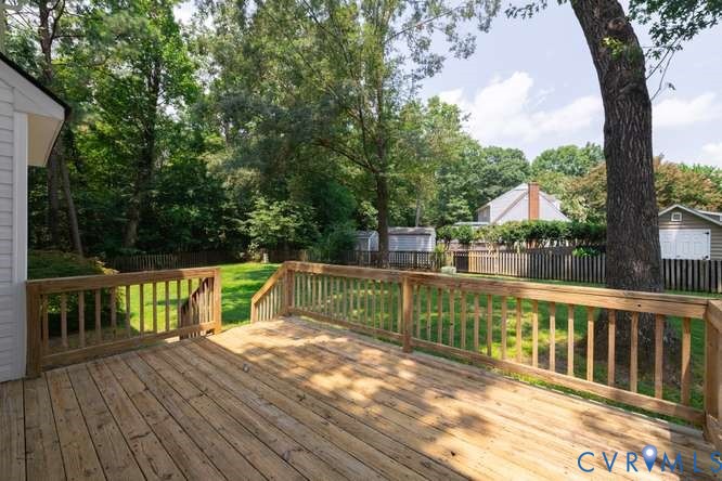 6118 Springwood Road Chester, VA 23831 - Photo 33 of 38 Spacious wood-finish deck with railing overlooking