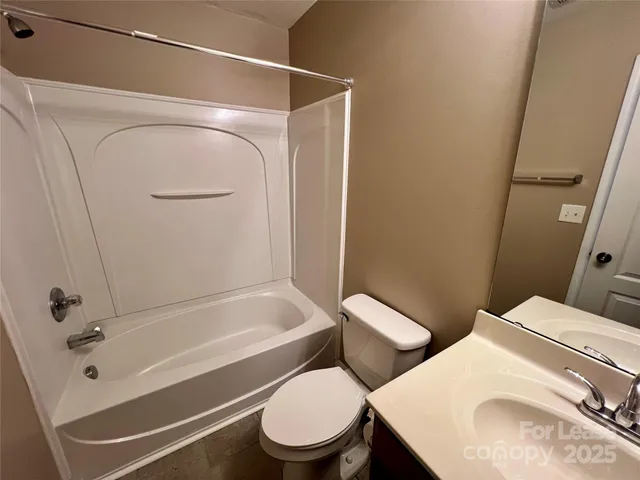 a bathroom with a sink and toilet