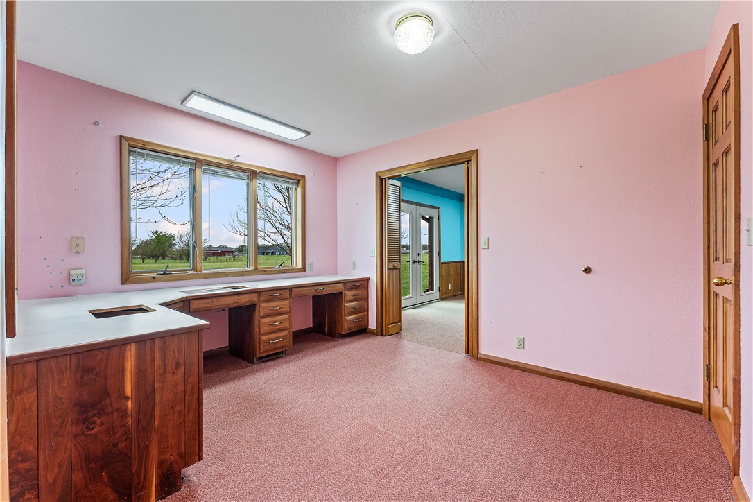 13258 Raccoon Road Granby, MO 64844 - Photo 18 of 37 Unfurnished office featuring light colored carpet and built in study area