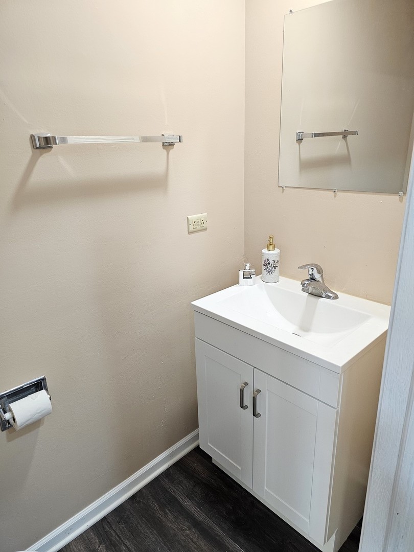 1529 Lighthouse Drive Naperville, IL 60565 - Photo 11 of 21 a bathroom with a sink and vanity