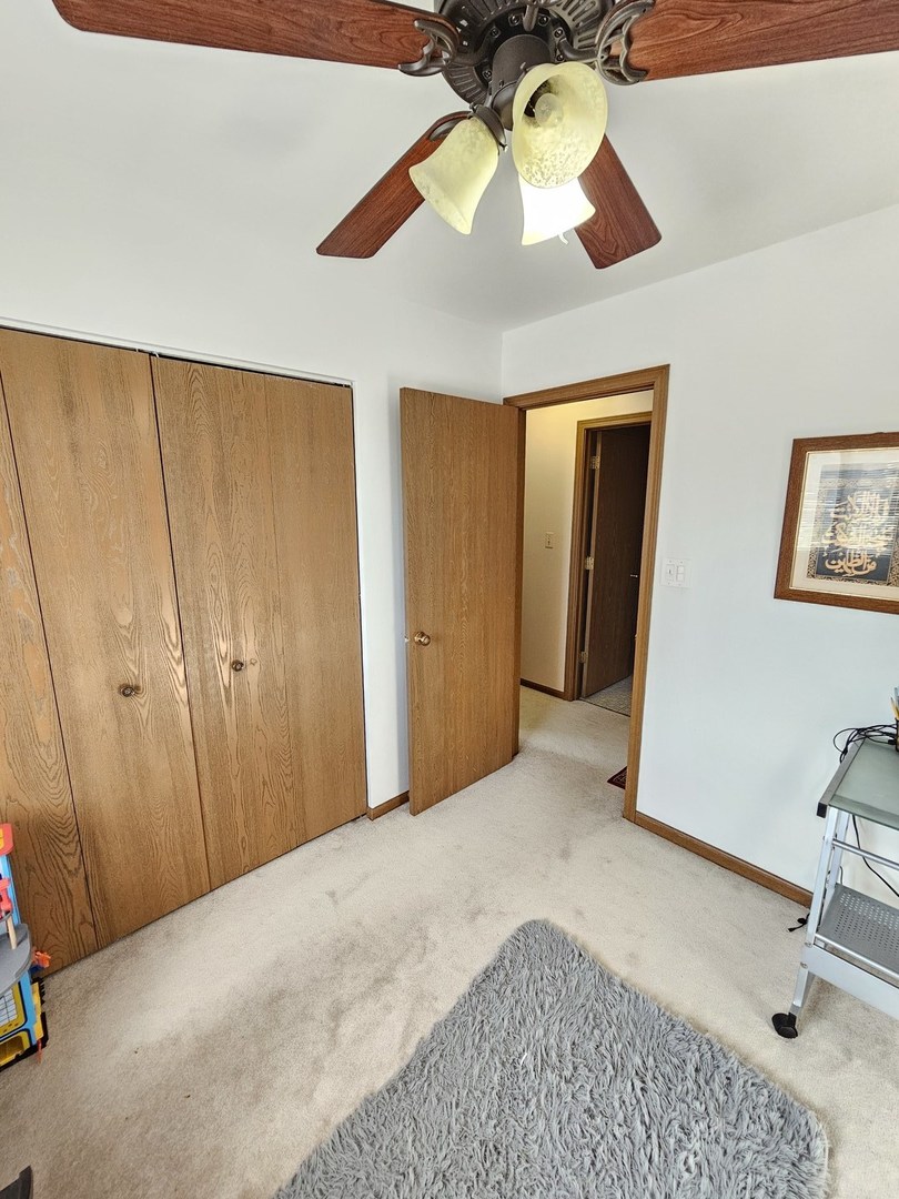 1529 Lighthouse Drive Naperville, IL 60565 - Photo 15 of 21 a view of a room with gym equipment