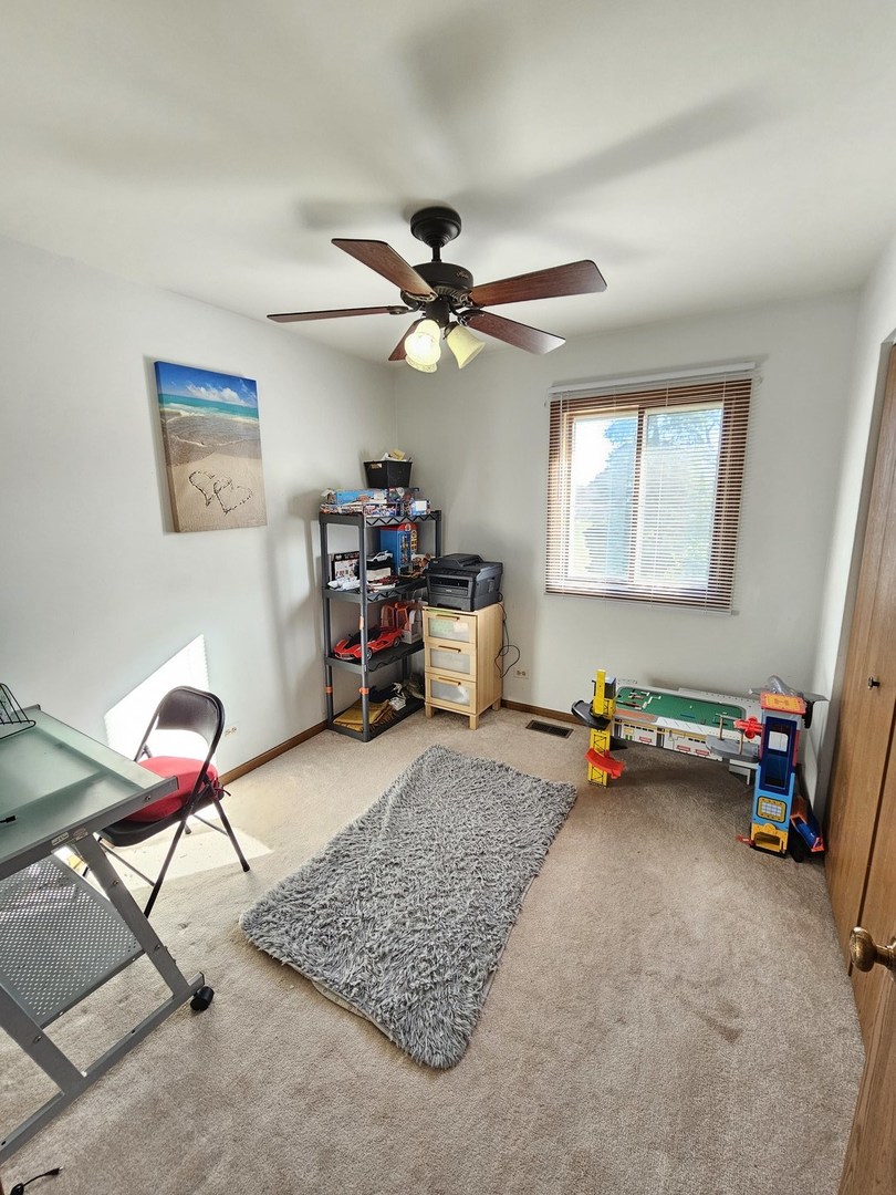 1529 Lighthouse Drive Naperville, IL 60565 - Photo 19 of 21 a view of a workspace with furniture