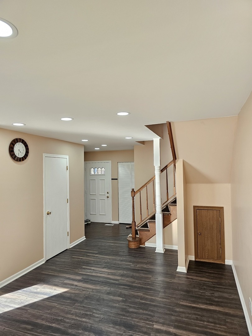 1529 Lighthouse Drive Naperville, IL 60565 - Photo 10 of 21 a view of entryway and hall with wooden floor