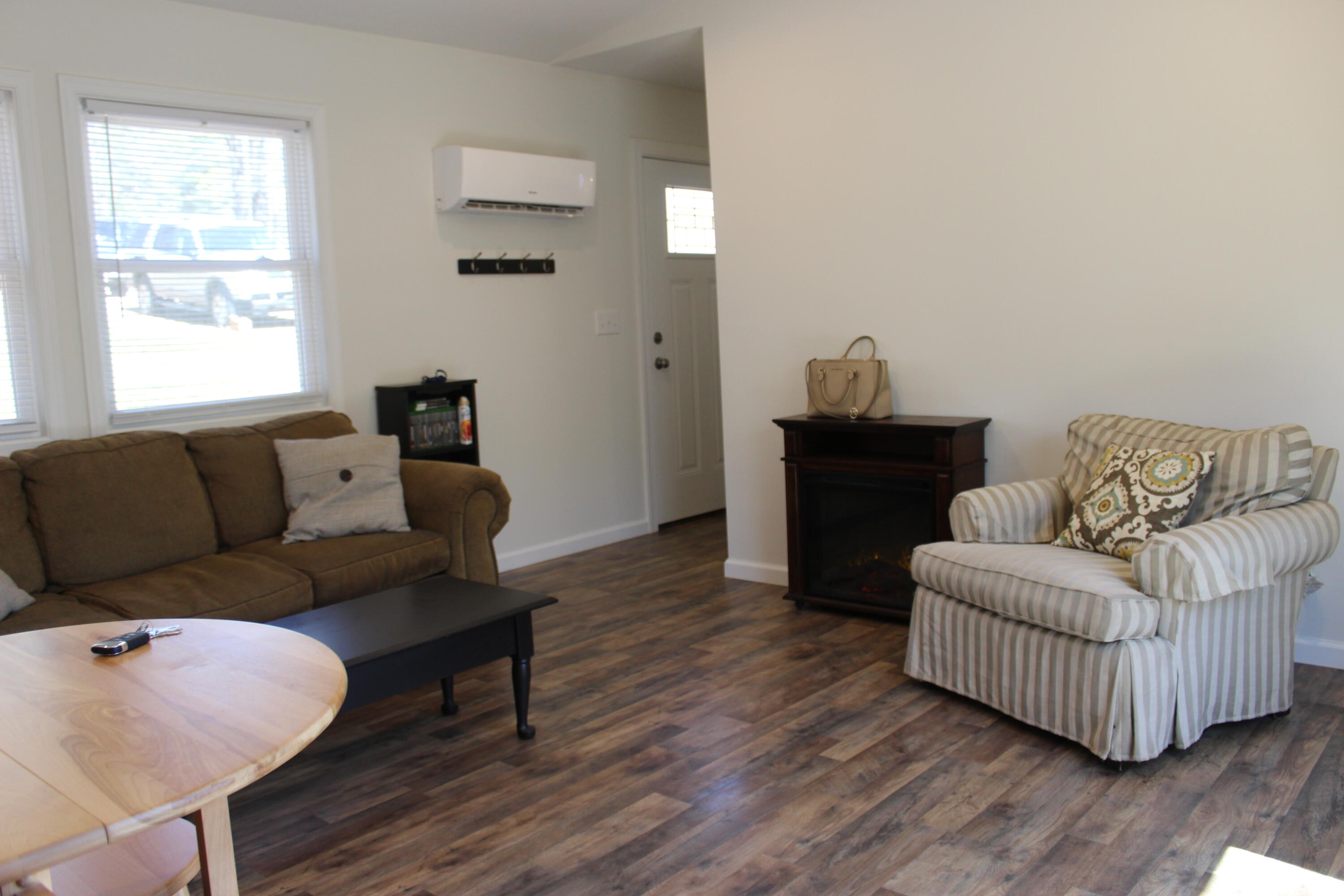 150 Idlewood Road Hardy, VA 24101 - Photo 8 of 24 a living room with furniture and a wooden floor