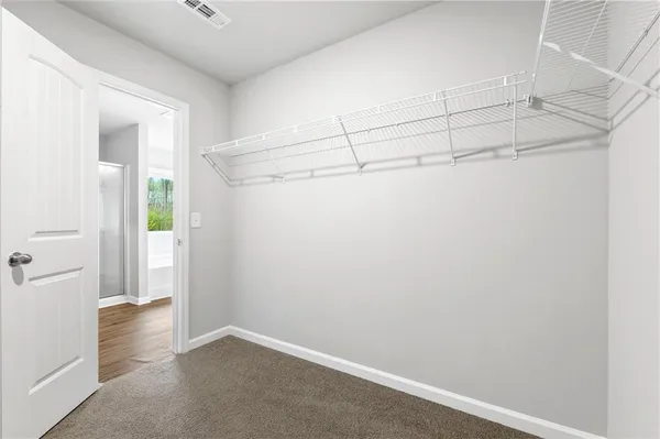 a view of a room with racks on the wall