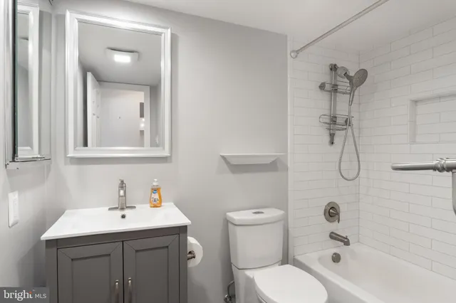a kitchen with cabinets and appliances