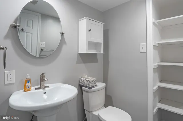 a white door and a shower curtain