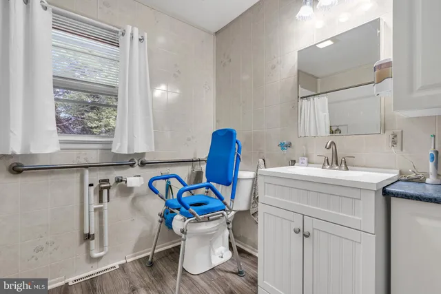 a bathroom with a sink toilet and a bathtub