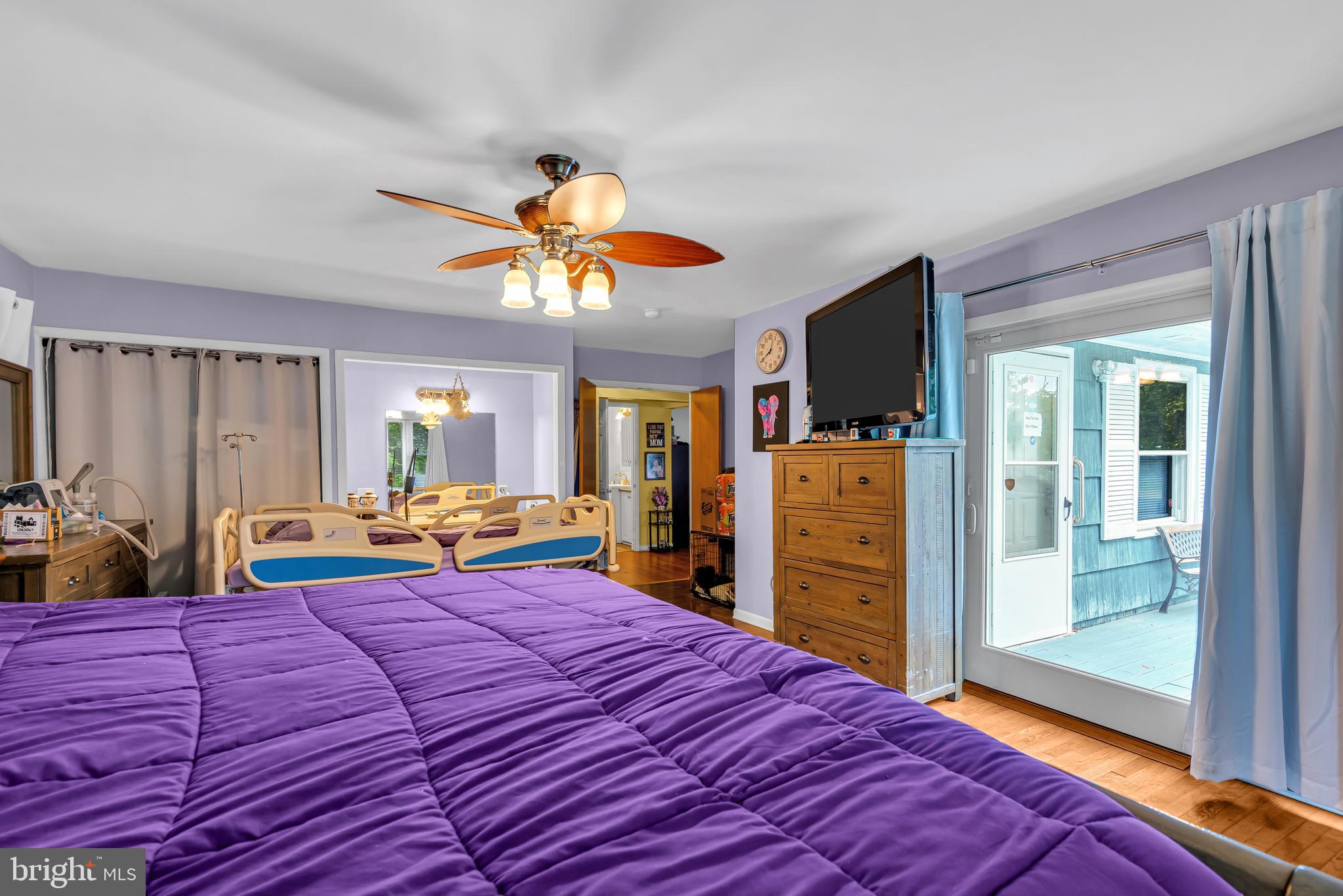 733 Buck Road Monroeville, NJ 08343 - Photo 17 of 24 a bedroom with a bed and a large mirror on the dresser