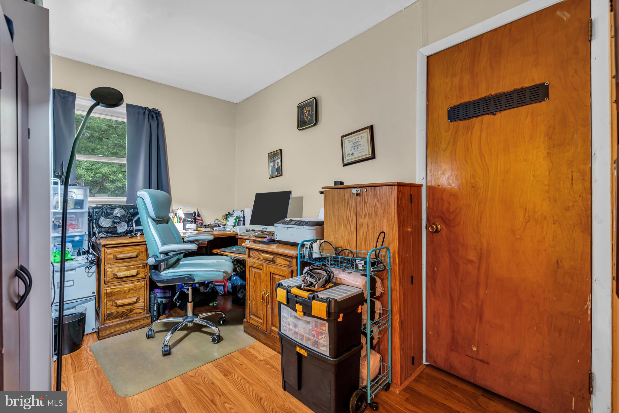 733 Buck Road Monroeville, NJ 08343 - Photo 20 of 24 a view of a workspace with furniture and a window