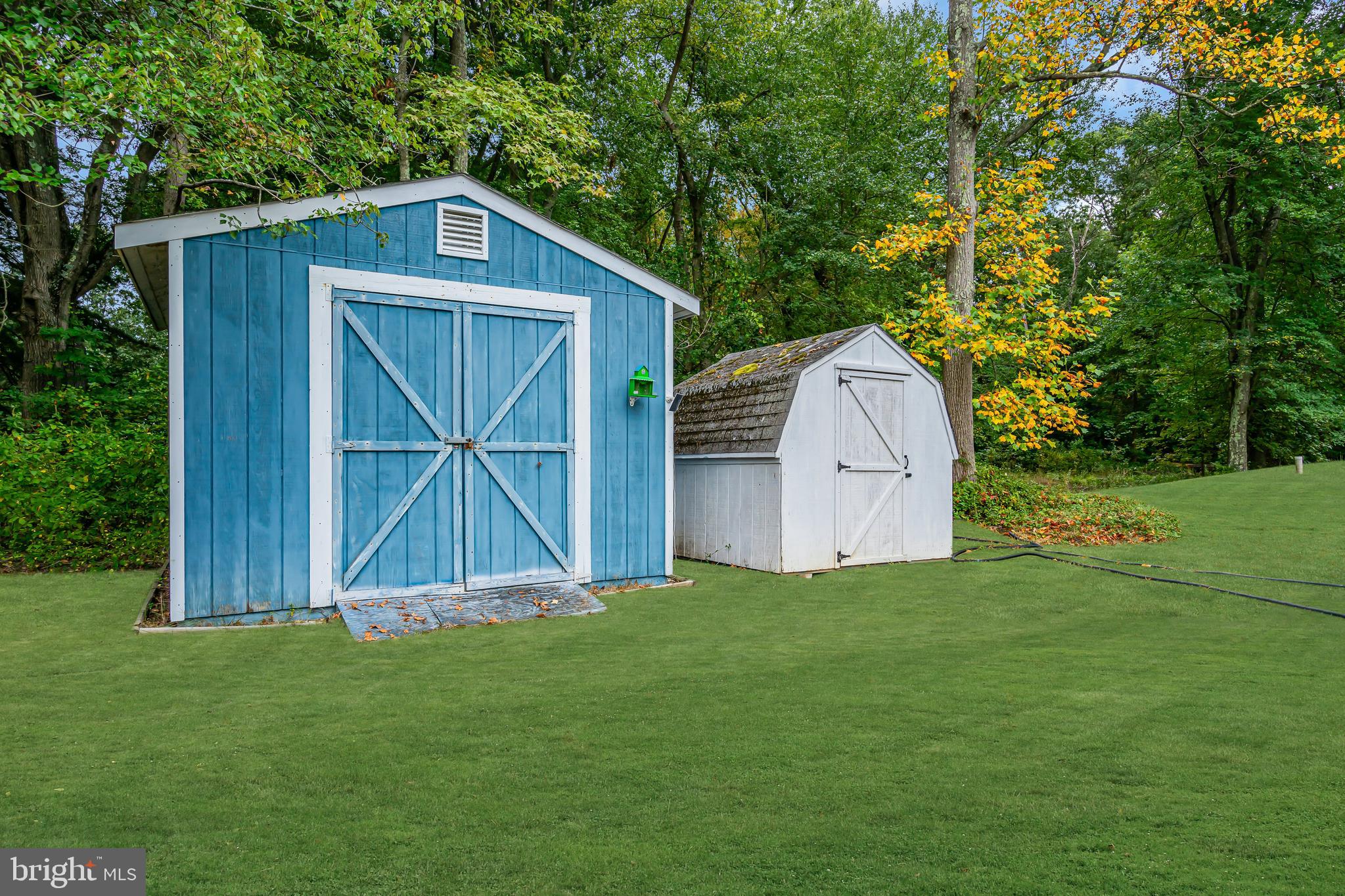 733 Buck Road Monroeville, NJ 08343 - Photo 22 of 24 a view of backyard with a barn and a large tree