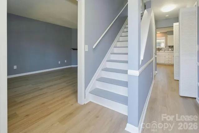 a view of staircase with white walls and white walls
