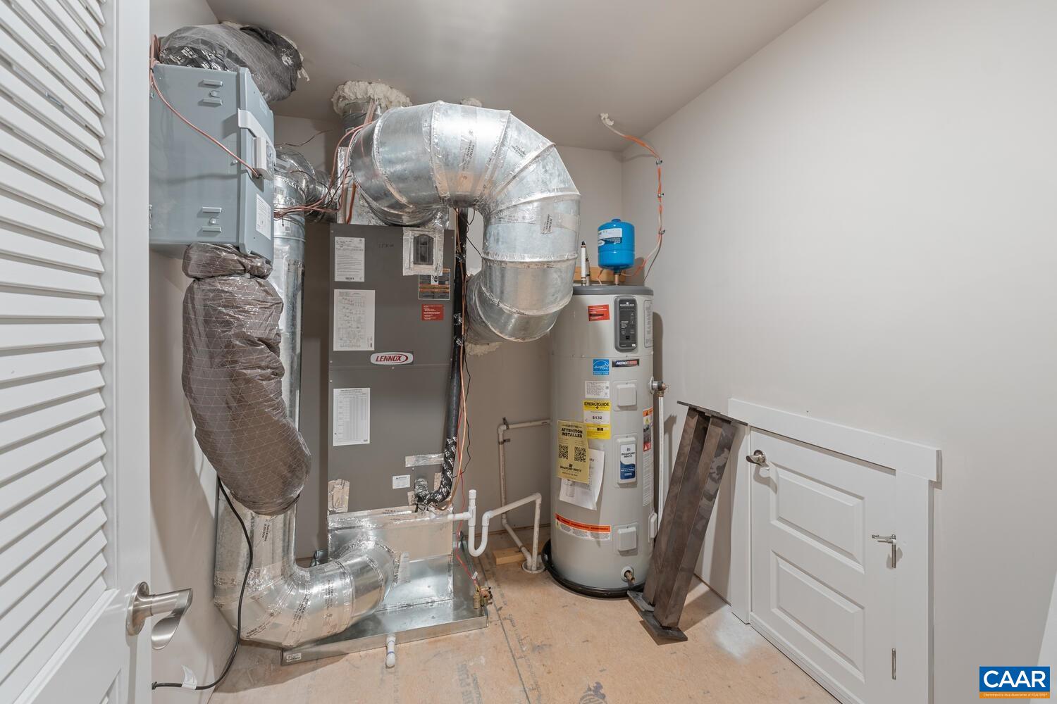 4 Jarmans Gap Road, Unit LOT 4 JARMANS GAP Crozet, VA 22932 - Photo 43 of 47 a dining room with table and chairs