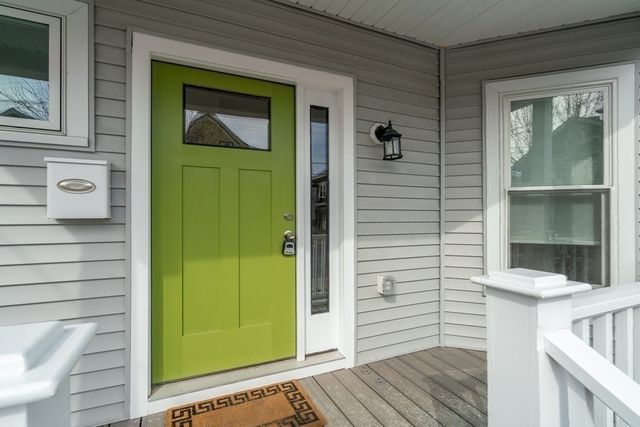 a view of a door and a window