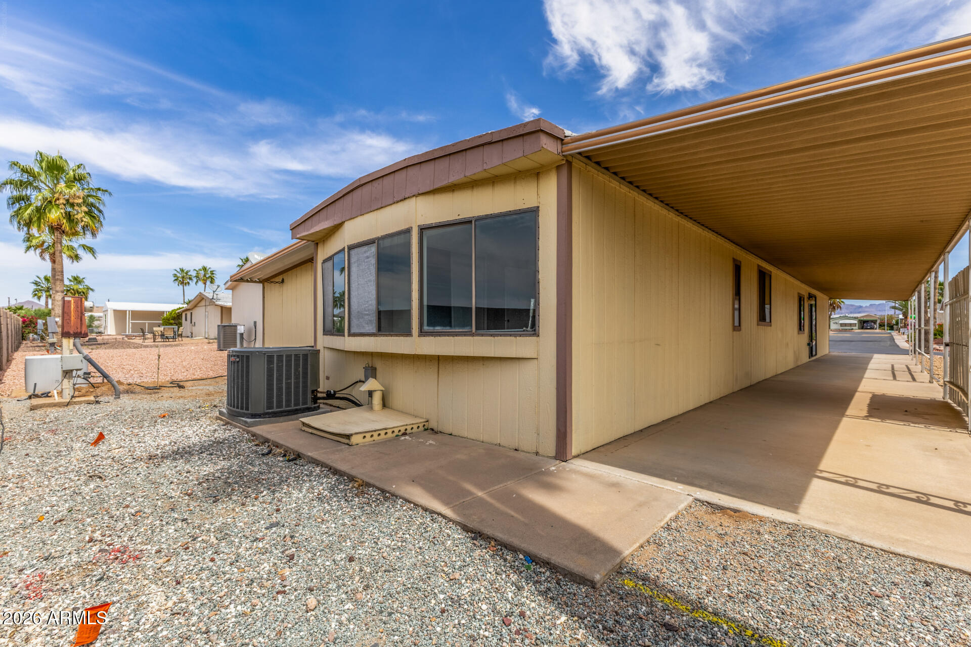 9302 East Broadway Road, Unit 155 Mesa, AZ 85208 - Photo 26 of 26 a view of a house with a patio