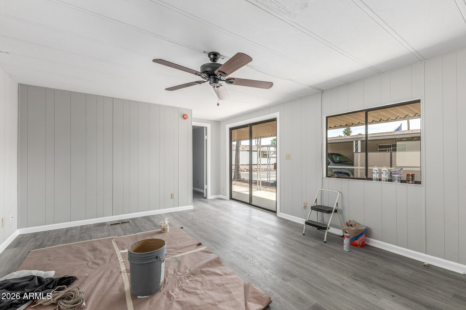 9302 East Broadway Road, Unit 155 Mesa, AZ 85208 - Photo 5 of 26 a living room with furniture and window
