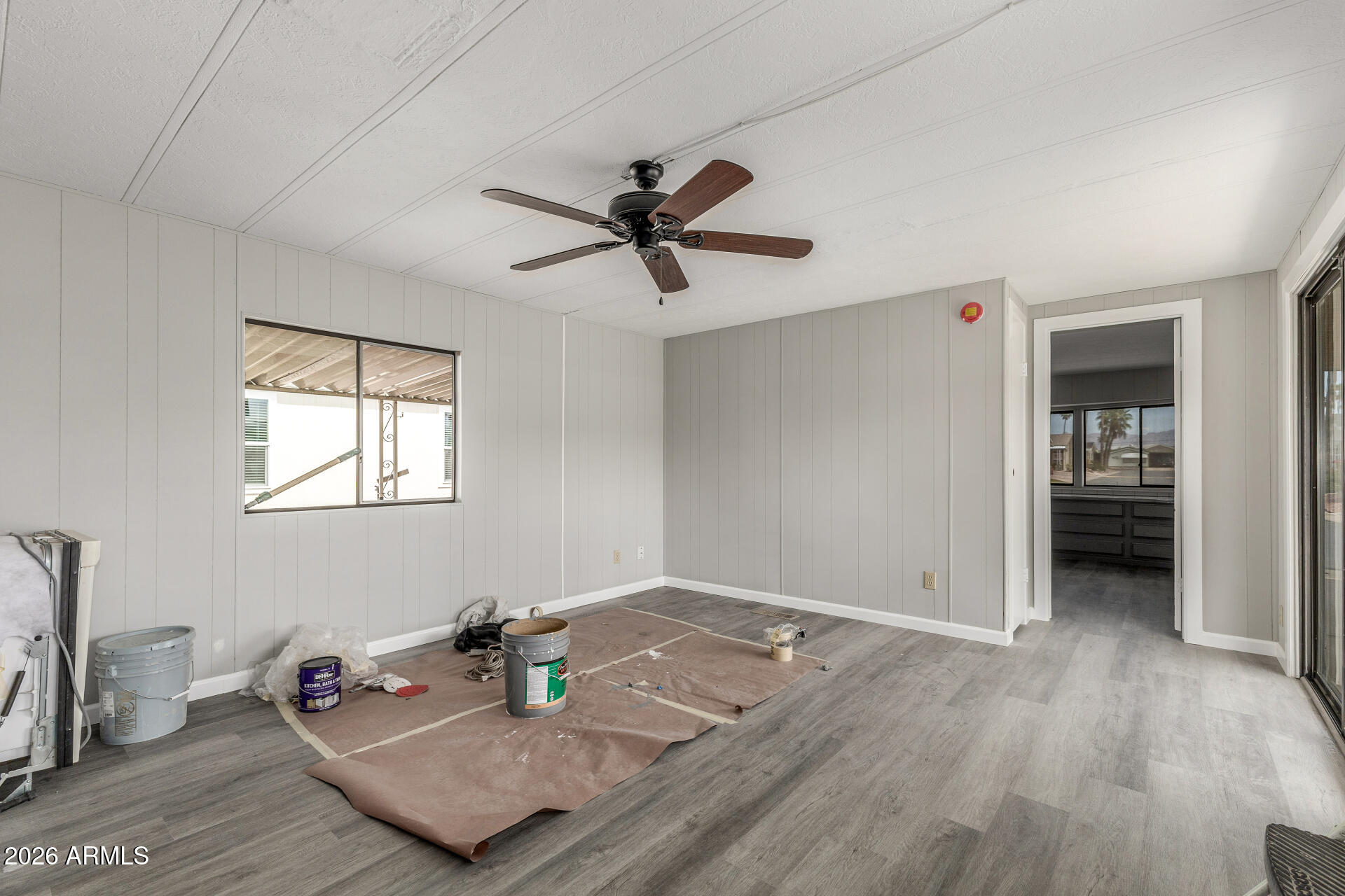 9302 East Broadway Road, Unit 155 Mesa, AZ 85208 - Photo 8 of 26 a table room with wooden floor and furniture