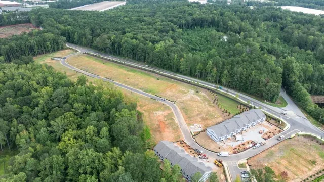 a view of a house with roof deck and dining room