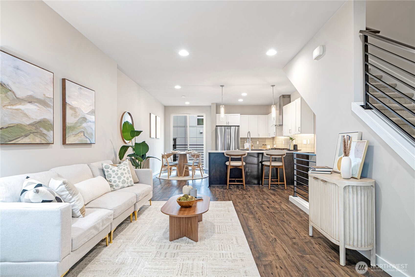 8554 22nd Place Northeast Seattle, WA 98115 - Photo 11 of 35 a living room with lots of furniture and kitchen view
