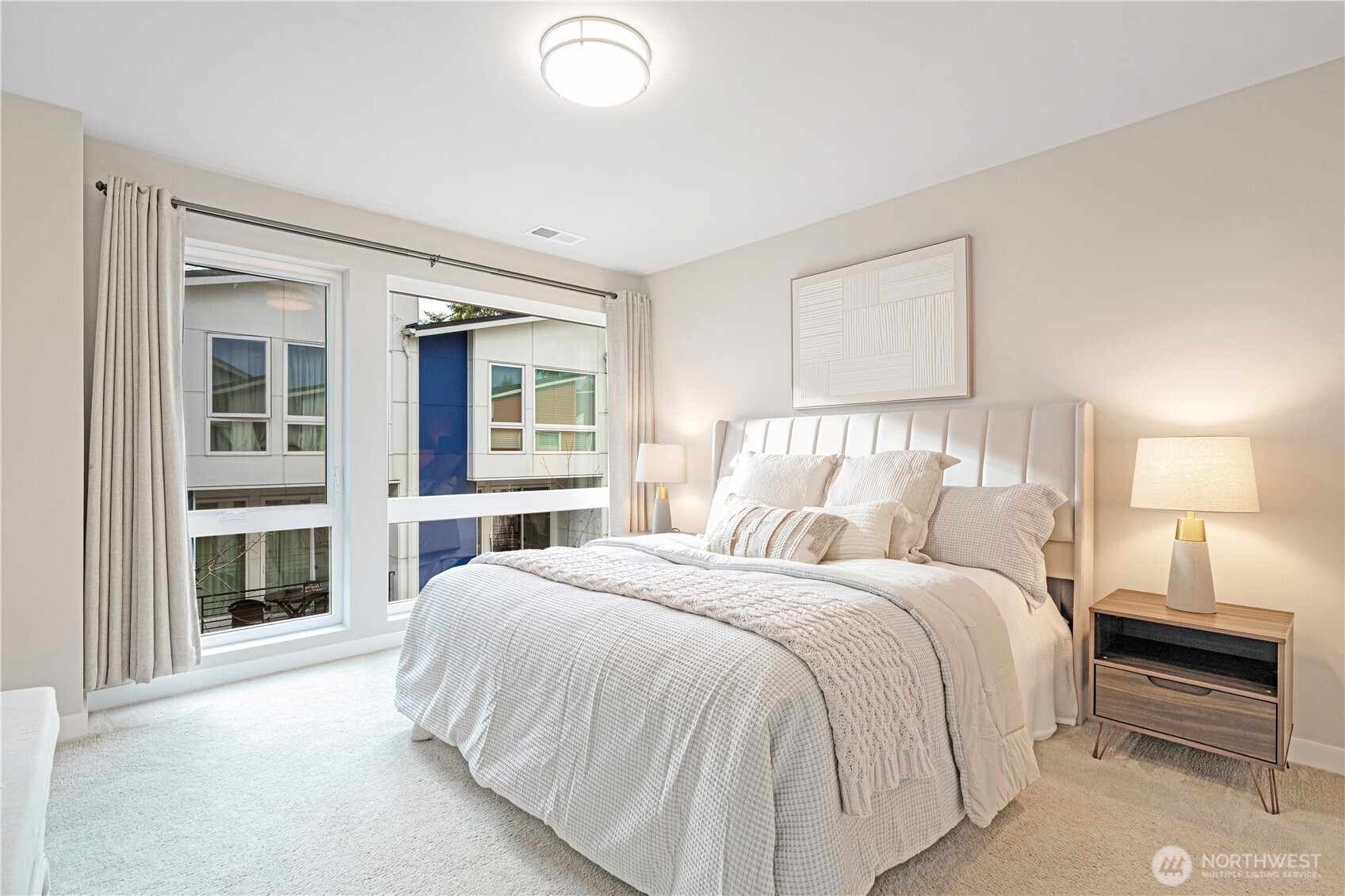 8554 22nd Place Northeast Seattle, WA 98115 - Photo 17 of 35 a bedroom with a bed and a window