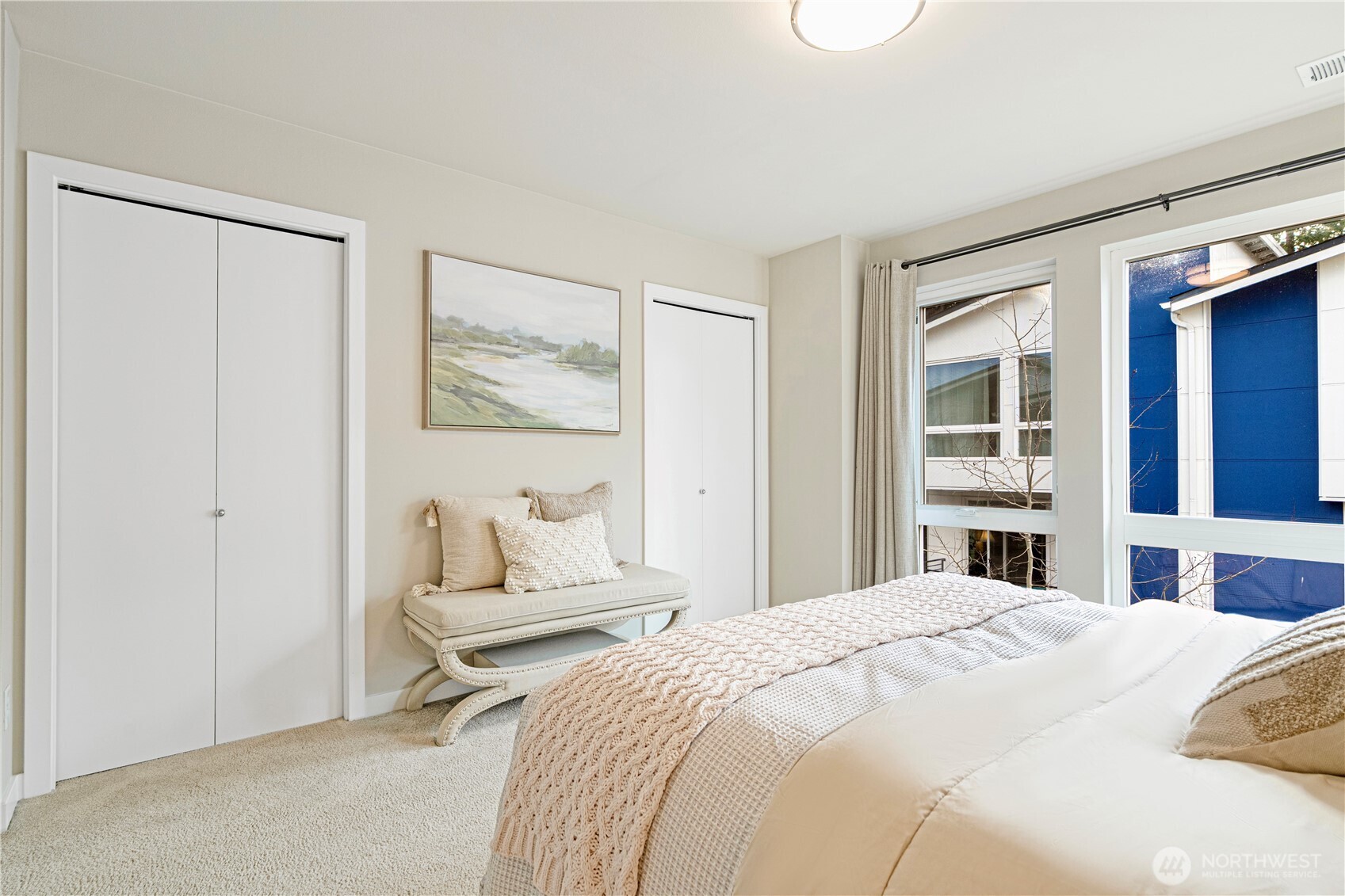 8554 22nd Place Northeast Seattle, WA 98115 - Photo 19 of 35 a bedroom with a large bed and a window